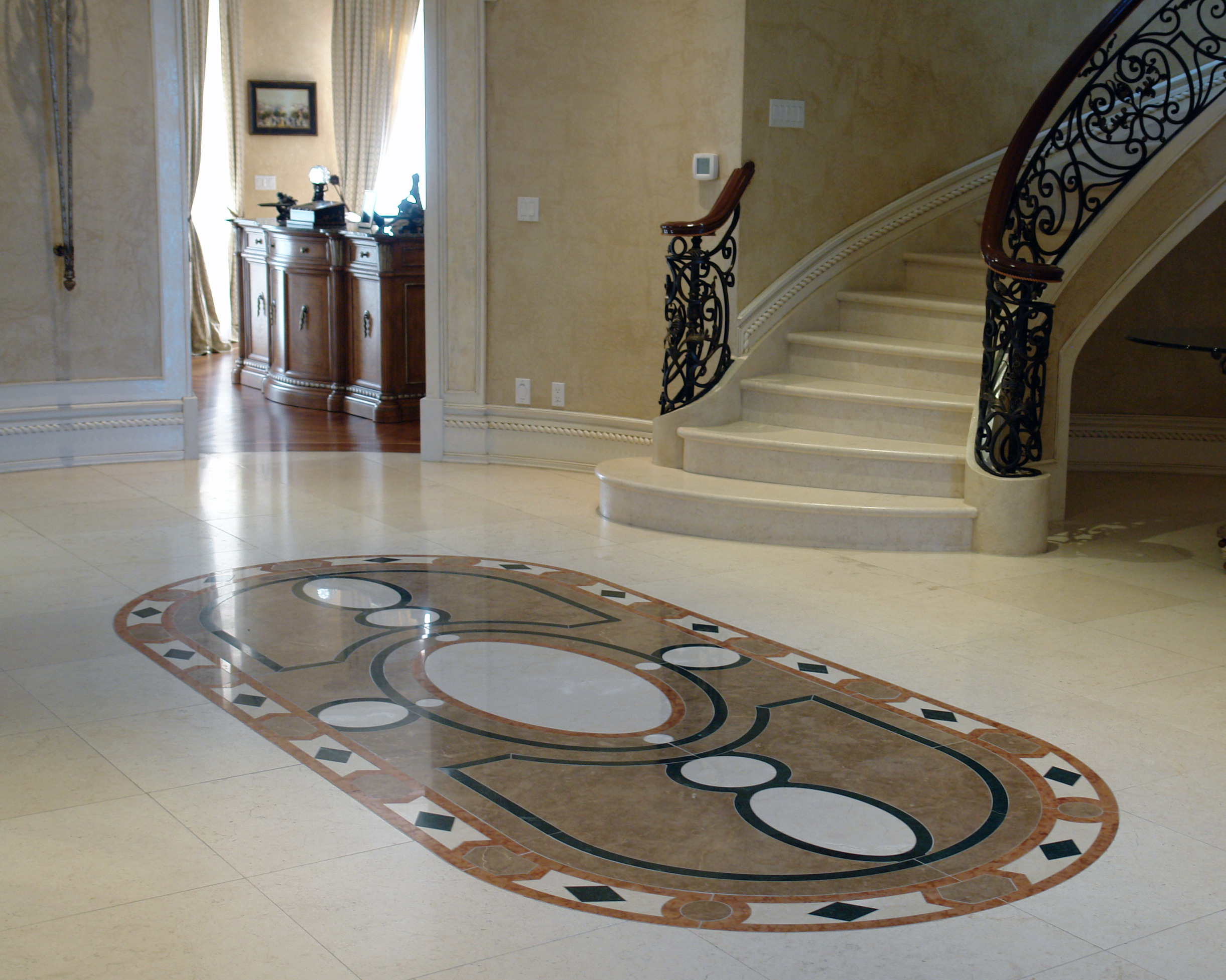 Gray Marble Medallion by Isabel Wallshape with Marble Staircase in Toronto Residence