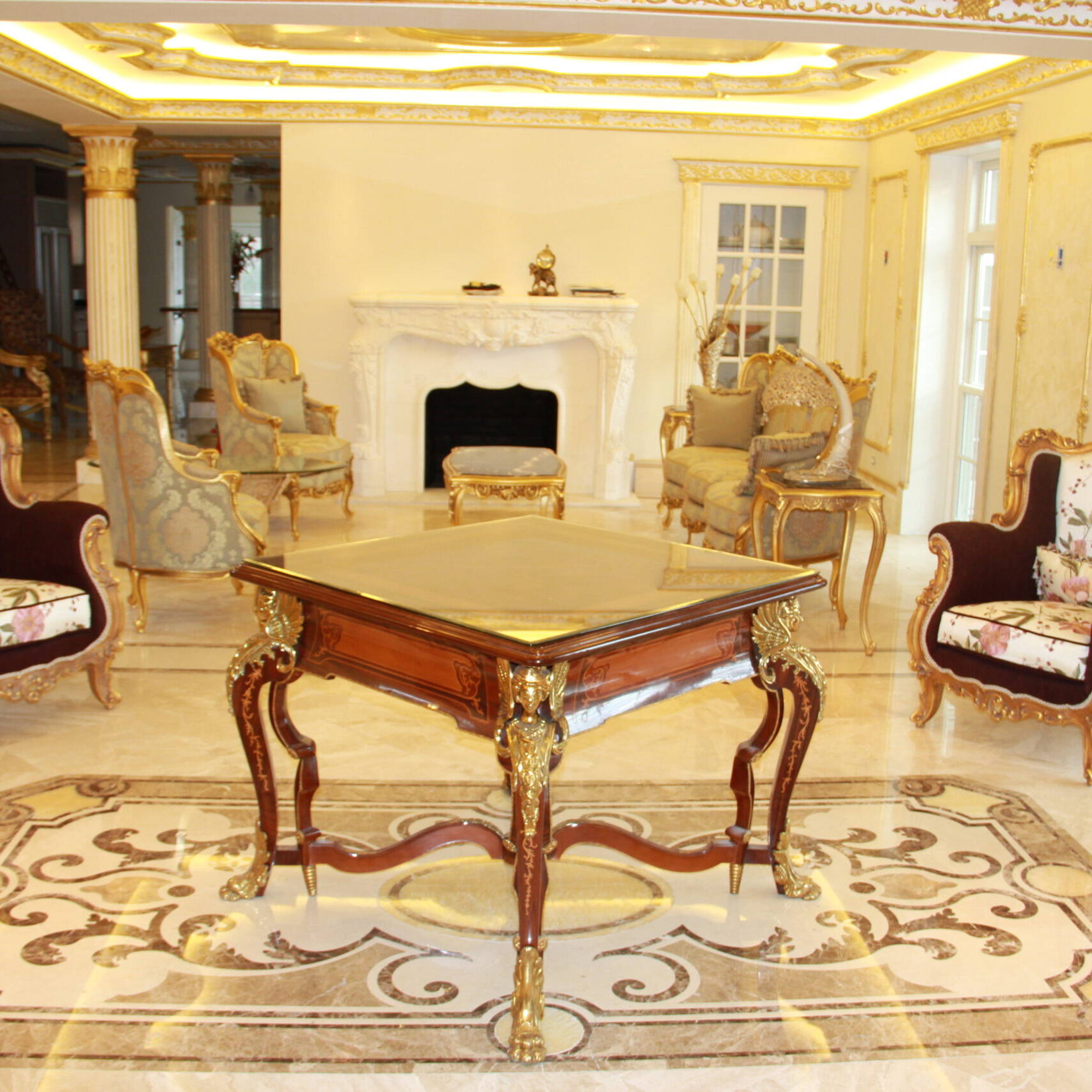 Botticino Marble Floor with Golden Medallion & Hand-Carved Marble Mantles in Grand Room